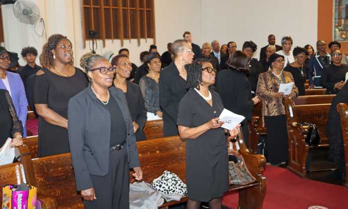 Congregation sings Opening Hymn, "Up from the Grave He Arose.”