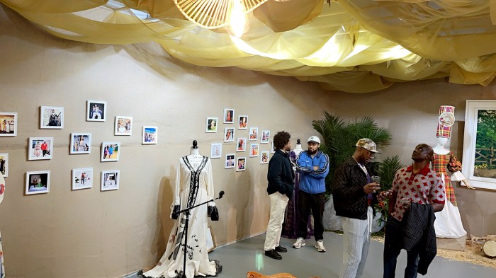 Patrons at the Haiti Cultural Exchange gallery in Brooklyn during Michel Chataigne's March 16, 2025, opening reception.