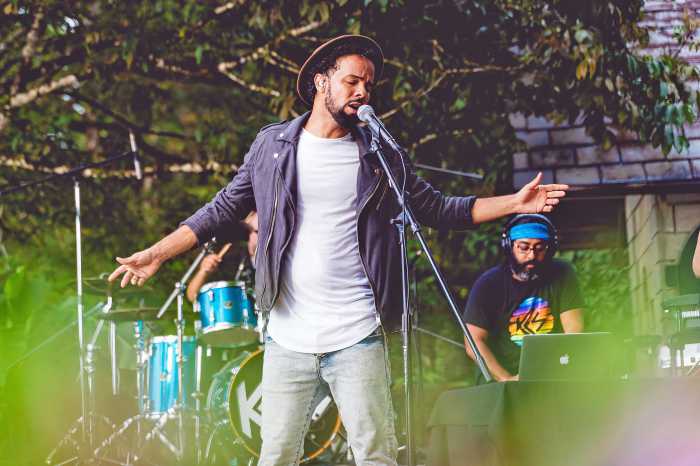 Soca artist Kees Dieffenthaller, frontman of Kes the Band, during one of his many performances.