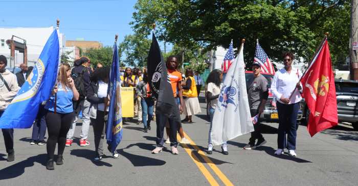 Flag bearers lead the 2025 Brooklyn Canarsie Lions Club Memorial Day Parade.