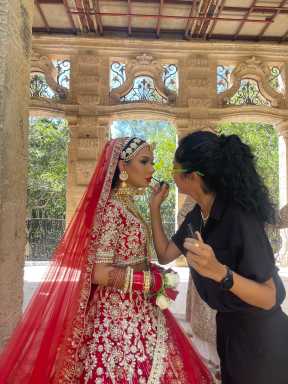 Sewett, renowned for her versatility in makeup artistry, prepares a bride for her special day, showcasing her expertise beyond SFX to include everyday beauty and glamorous looks.
