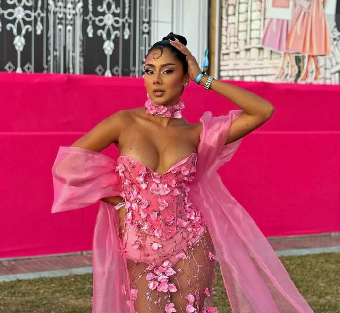 Sewett poses in a self-designed outfit during a Trinidad carnival. In addition to makeup, the multi-talented creative expresses herself through fashion design, graphic art, and content creation.