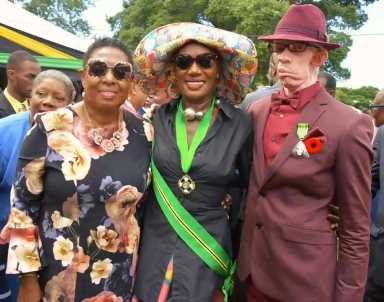 Jamaica's Minister of Culture & Gender & Entertainment and Sports Olivia Grange with actress / singer Grace Jones and reggae icon King Yellowman.