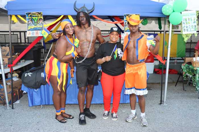 Delahanty Isles, third from left, with Sanique Delpesche, left, and brothers Anu Stewart, second from left, and Mekiel Stewart in Nowadazz's Promotions, Inc.'s "Waybaccwen" for J'Ouvert in Vincy Mas 2025.