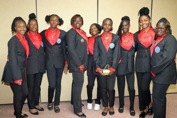 CEMSS girls' athletes with manager Niketa Isles, right, and female coach Roatter Johnson, fourth from left, at reception in Philadelphia.CEMSS girls' athletes with manager Niketa Isles, right, and female coach Roatter Johnson, fourth from left, at the reception in Philadelphia.