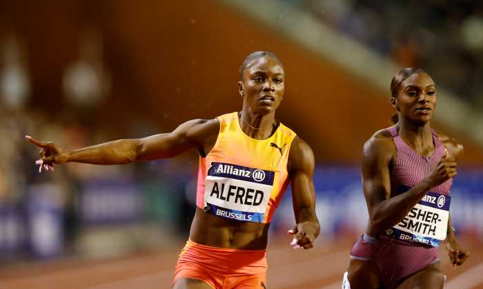 Saint Lucia's Julien Alfred wins the women's 100m final ahead of Britain's Dina Asher-Smith during the Diamond League event at the King Baudouin Stadium, Brussels, Belgium on Sept. 13, 2024.