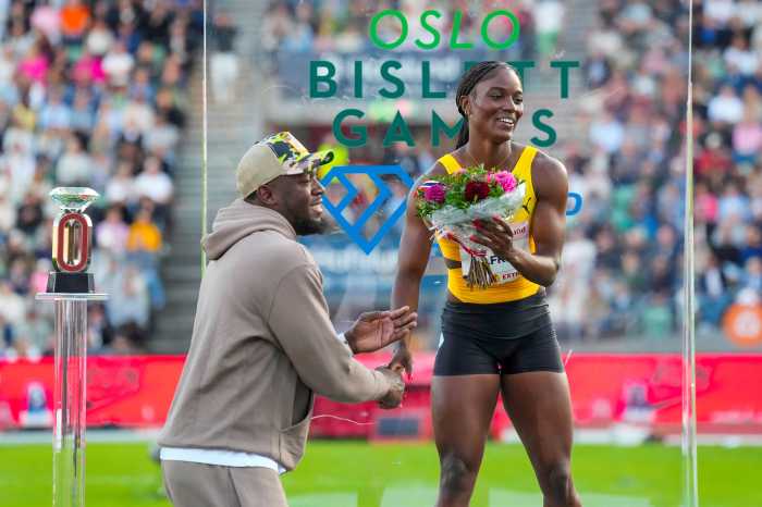 Saint Lucia's Julien Alfred shakes hands with Usain Bolt after winning the women's 100m during the Diamond League at the Bislett Stadium, Oslo, Norway on June 12, 2025.