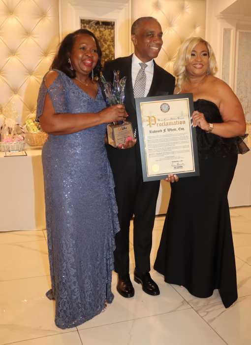 Rudyard Whyte, Esq., CALA’s vice president, receives the President’s Award from Justice Sylvia Hinds-Radix, left, and proclamation from legal colleague.