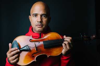 Haitian American violinist and composer Daniel Bernard Roumain.