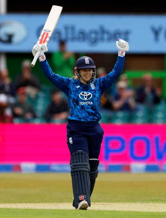 England's Tamsin Beaumont celebrates after completing her century in the Second Women's One-Day International against the West Indies at the Uptonsteel County Ground, Leicester, Britain on June 4, 2025.