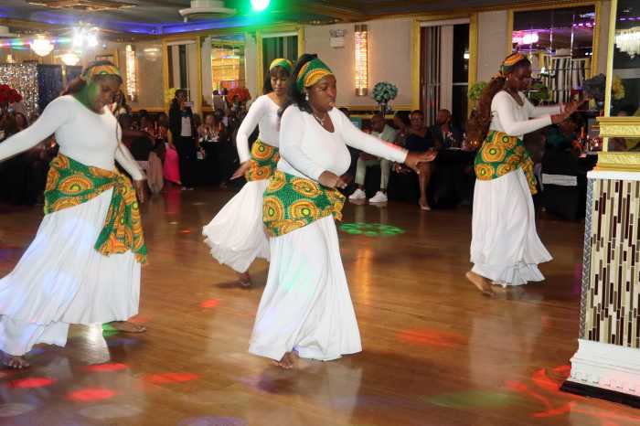 Divine Worshippers at St. Mark's United Methodist Church dance during Yvonne Peters's retirement party.