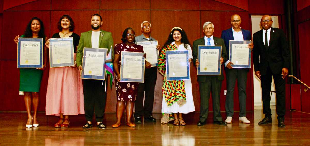 Guyanese-American honorees from left, Shivika Rajkisore, Jessica Balgobin, Mohamed Q. Amin, Candace E. Prince-Modeste, Latchman Budhai, Aminta Keliwan-Narine, Ashook Ramsaran, and Vikash Narine, and Queens Borough President Donovan Richards. The expats were honored for their contributions to the borough on May 29 at QBH 59th Independence celebration.