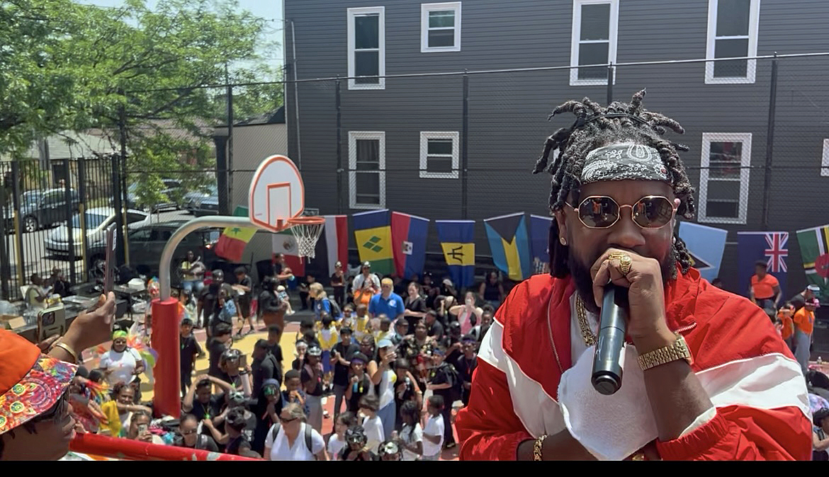 Lyrikal entertaining the students of Public School 244 on Tilden Avenue in East Flatbush during their inaugural carnival.