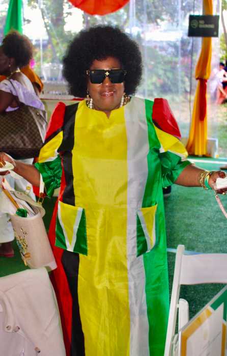 President of the Guyana American Heritage Foundation, NJ. Lady Ira Lewis decked out in her Golden Arrowhead Flag colors representing her country in fine style, during during a dynamic dynamic heritage reception on July 22, at Gracie Mansion in Manhattan, hosted by Mayor Eric Adams, who is running for re-election on Nov. 4, as an Independent candidate.