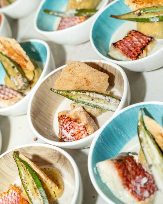 Chef Sean Kylen presents Coconut Seafood Sere Lasus, served with pounded plantain (Hudut) and cassava bread.