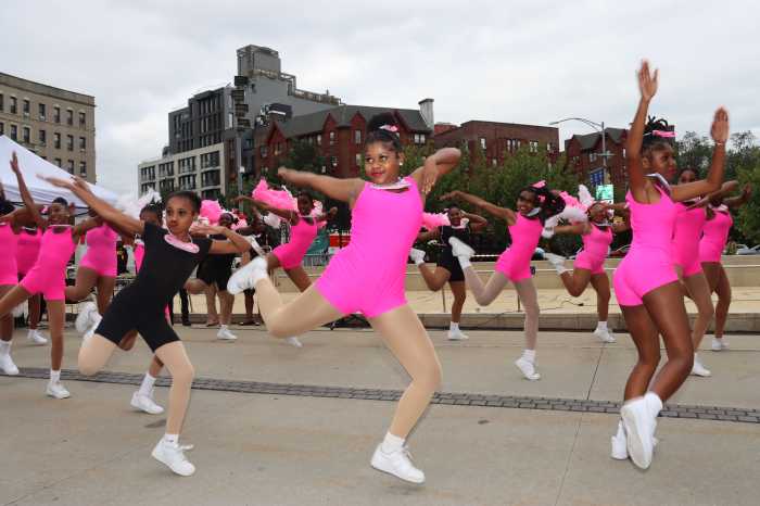 dancers in pink outfits at launch of West Indian American Day Carnival at Brooklyn Museum
