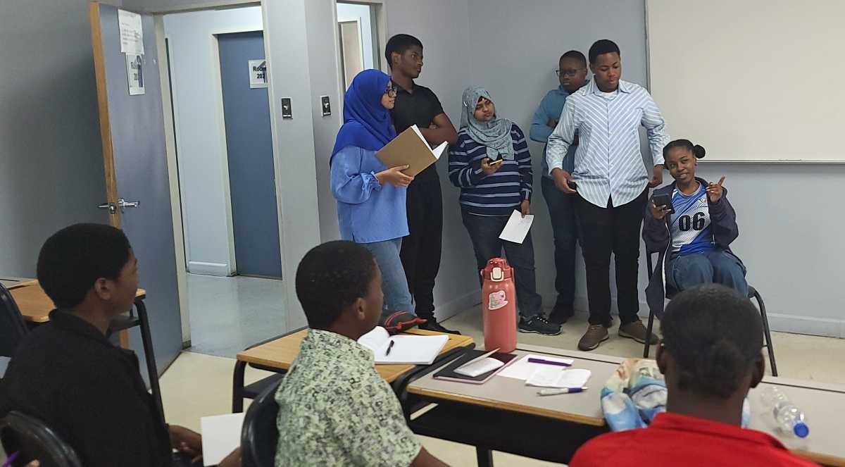 Students discussed and prepared to share original research on pressing mental health topics.