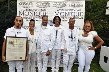 NYS Assemblywoman Monique Chandler-Waterman, (second from left) with honorees Busta Rhymes, his sons, and Dr. Meta.