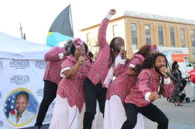 The melodious voices of the Braata Folk Singers, on Aug. 10, filled the air over the Holy Family Church tarmac in Canarsie, at a Bankra Caribbean Folk Festival in partnership with Assembly Member Monique Chandler-Waterman and Assembly Member Jamie Williams, State Senator Roxanne Persaud, and U.S. Rep. Hakeem Jeffries.