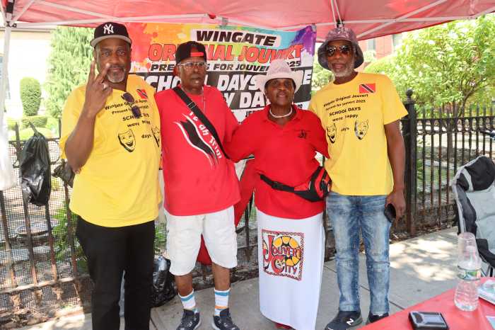 Yvette Rennie with members of the Wingate Original J'Ouvert Band.