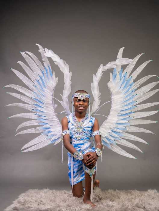 Masquerader in "Dove Dynasty" costume.