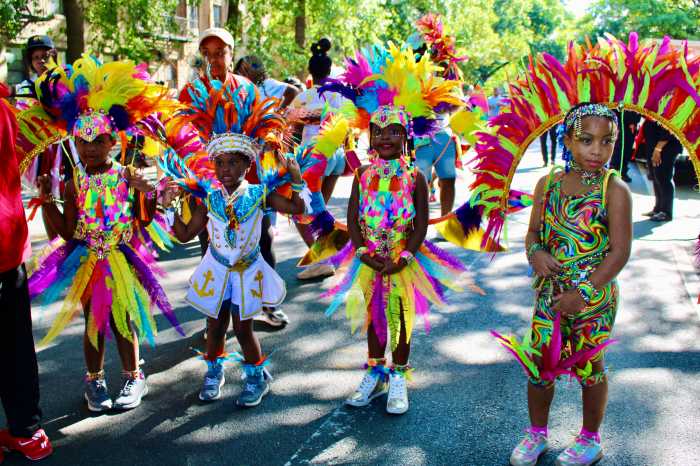 This colorfully costumed bunch of little ones are ready to mas in Karibbean Island Puls Kidz that depicted "Five Senses of Carnival" in the Junior Carnival road march in Crown Heights, Brooklyn on August 30.