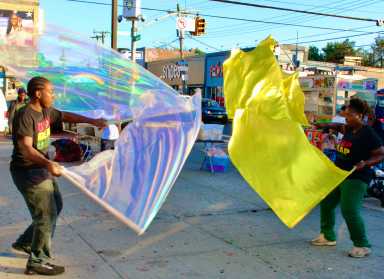 A Flag Dance is performed by Stephon and Princess Cronniett during a Sept. 11 remembrance in Canarsie organized by Leaders Engaging in All-Round Development International (LEAD*N).