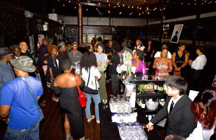 The crowd celebrating the exhibition.