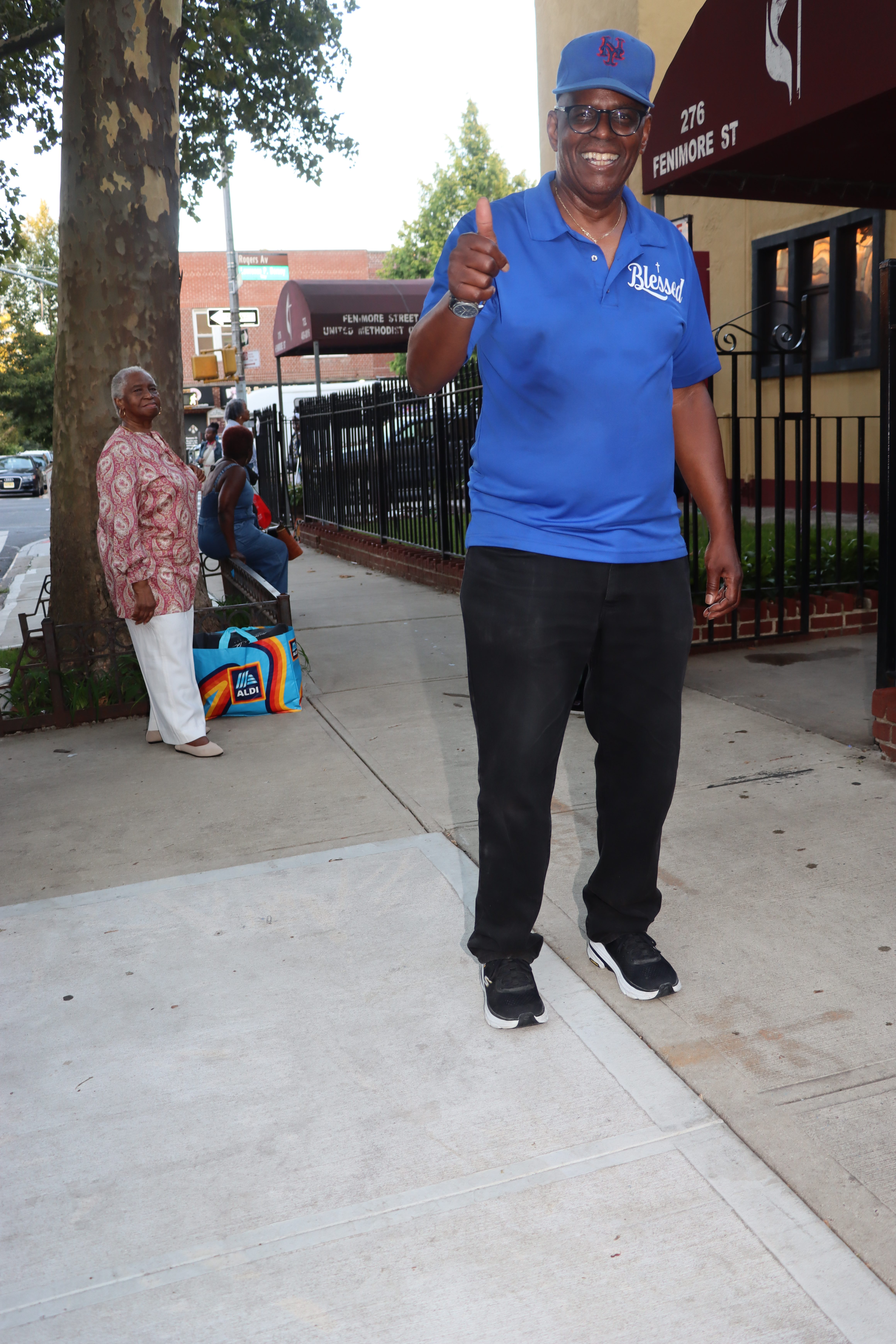 Pastor the Rev. Roger Jackson gives the thumps up at Block Party's end