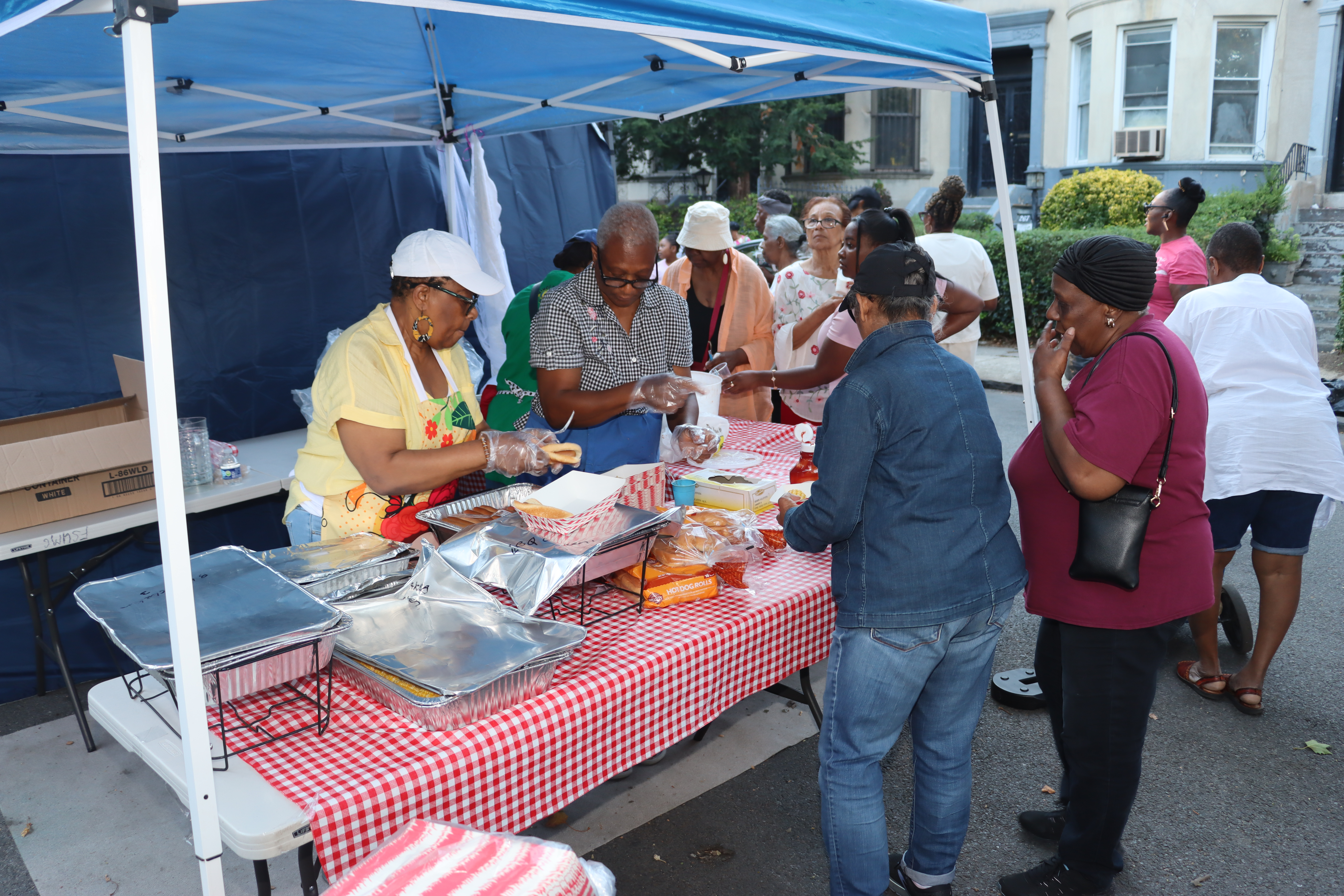 Serving snacks to Block Party-goers