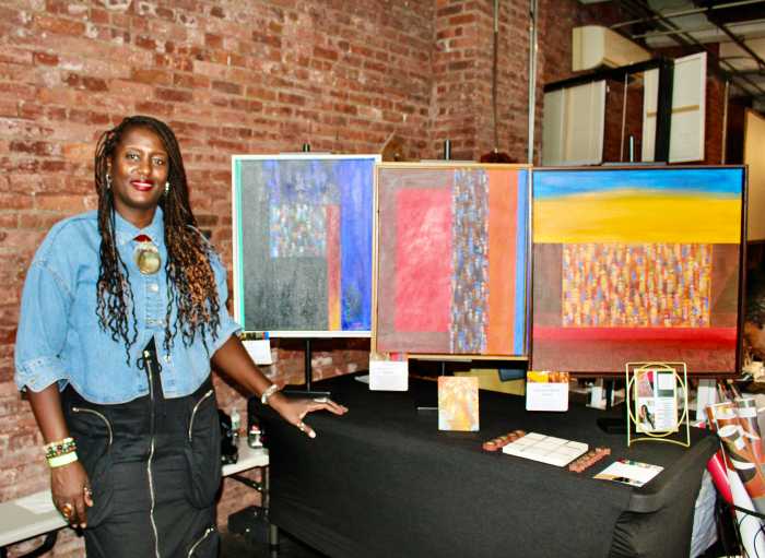 Brooklyn-based Tara showcases her Ancestors artwork, during a display at a Sept.13 Black Art Matters Pop-Up tour at Waverly Street, art space in Brooklyn.