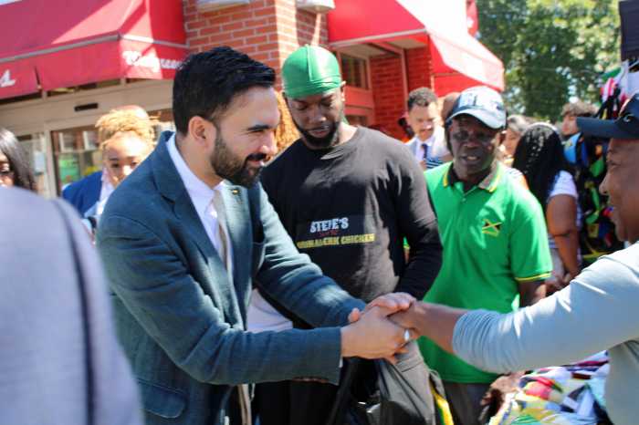 New York City Mayoral candidate Zohran Mamdani greeting nationals on Church Avenue, in Little Caribbean on Aug.30, during a tour.