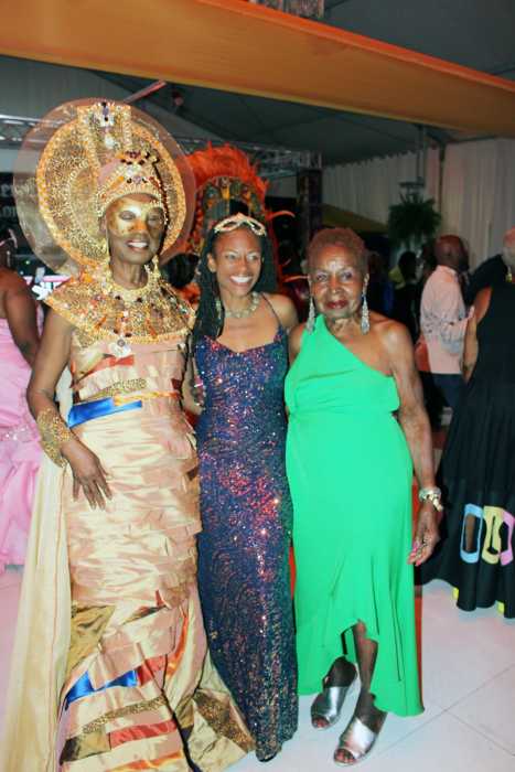 From left, Donna Bridgeman of Sssilent Partner Productions, Assemblywoman Monique-Chandler, and Angela Sealey, strike a pose at the 8th Annual Masquerade Ball, at Marine Park Golf Course, in Brooklyn. on Sept. 20, 2025.