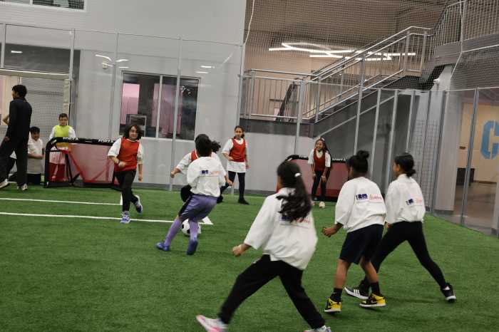 Children participate in a soccer clinic led by professional coaches and Carli Lloyd following the press event announcing new community investments ahead of the FIFA World Cup 2026.