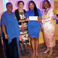 Veronica Weekes, third from left, receives scholarship award, flanked by Dr. Virginia Bernard, RN, president of the Bronx, Manhattan and Westchester Chapter of the Caribbean American Nurses’ Association, Inc. (CANA), right; Mistress of Ceremonies Wendy Lake-Ricke, RN, left; and Lorna Ferriera, RN.
