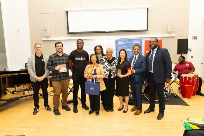 From left, Alpha School of Music’s Joshua Chamberlain, BMCC Professor Jon De Lucia, Evad Campbell, Patricia “Miss Pat” Chin, Gay Magnus, Margaret Little Wilson, Eugenia Oi Yan Yau, Sanjay Ramdath and Consulate General of Jamaica’s Christopher Benjamin.