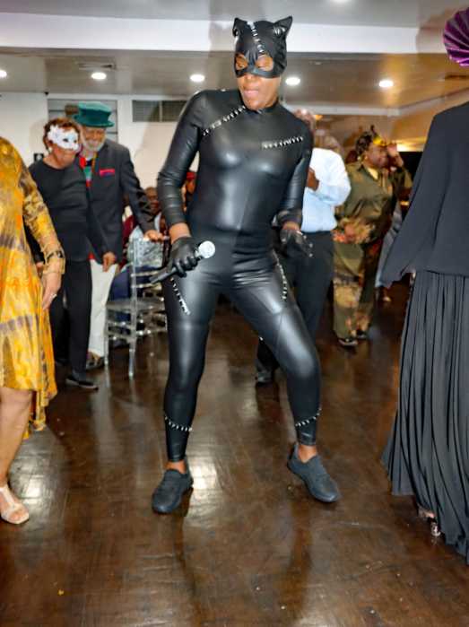Brooklyn Canarsie Lions Club Member Kamla Millwood in full masquerade costume hits the dance floor.