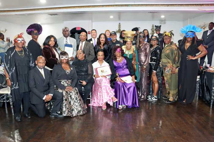 Honorees with certificates and members of the Brooklyn Canarsie Lions Club.
