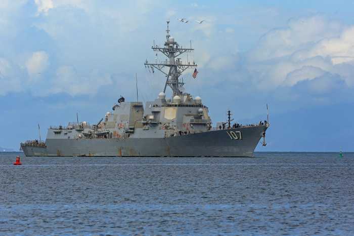 The U.S. Navy destroyer USS Gravely (DDG-107) approaches Port of Spain, Trinidad and Tobago on Oct. 26, 2025.