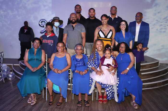 Gloria Lewis, center, front row, with immediate family members.