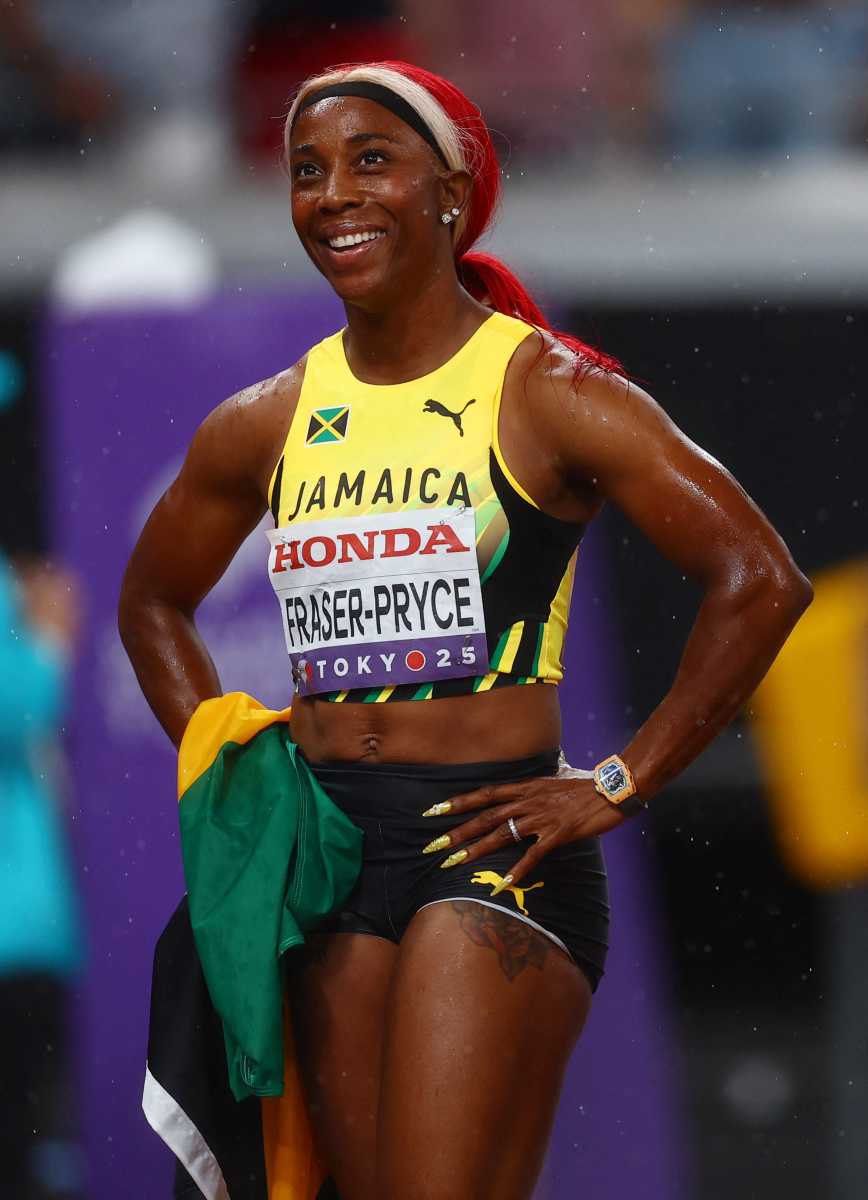 Silver medalist Jamaica's Shelly-Ann Fraser-Pryce celebrates after finishing second in the Women's 4 x 100m Relay Final at the World Athletics Championships Tokyo 2025 on Sept. 21, 2025.