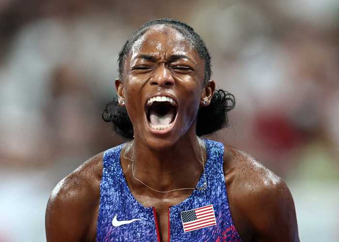 Melissa Jefferson-Wooden of the U.S. celebrates after winning gold in the Women's 4 x 100m Relay Final during the World Athletics Championships Tokyo 2025 on Sept. 21, 2025.