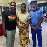 Celebrated Jamaican footballer player and cultural figure Allan 'Skill' Cole (R) sharing lens time with Louis Grant (Irie Jam Radio, NY) and Niambe McIntosh, daughter of reggae icon Peter Tosh, at the annual Peter Tosh Symposium in Kingston, Jamaica on Oct. 16, 2024.