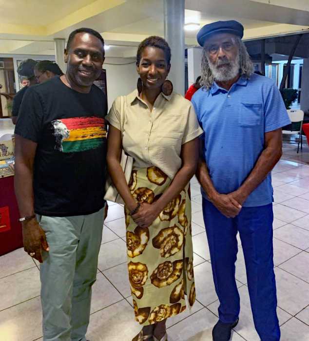 Celebrated Jamaican footballer player and cultural figure Allan 'Skill' Cole (R) sharing lens time with Louis Grant (Irie Jam Radio, NY) and Niambe McIntosh, daughter of reggae icon Peter Tosh, at the annual Peter Tosh Symposium in Kingston, Jamaica on Oct. 16, 2024.