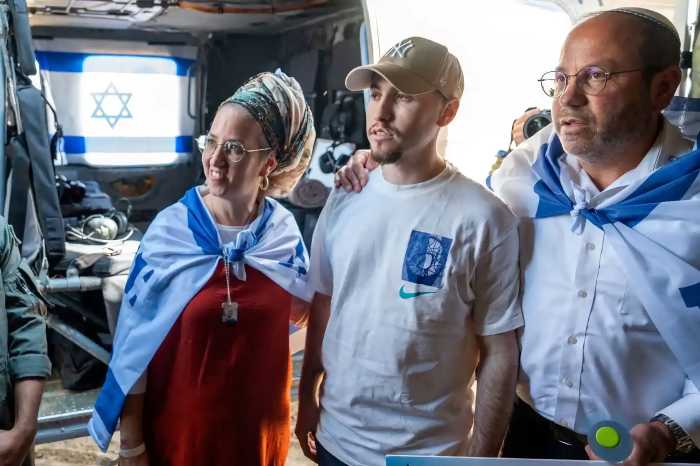 Released Israeli hostage, Eitan Abraham Mor, held in Gaza since the deadly Oct. 7, 2023 attack by Hamas, as part of a prisoner-hostage swap and a ceasefire deal between Israel and Hamas, is reunited with his family, in Reim, in Israel Oct. 13, 2025.