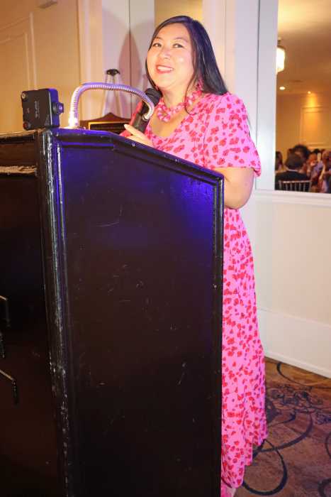Sabrina HoSang Jordan gives acceptance speech.
