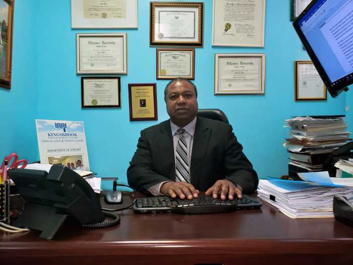 Roland Ottley, Esq. in his law office.