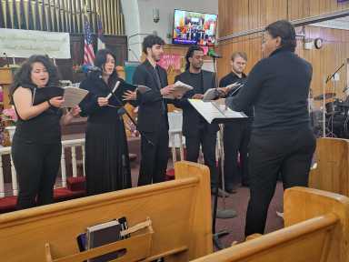 Jacqueline Hopkins conducts The Jacqueline Hopkins Choir during its world premiere at FSUMC.