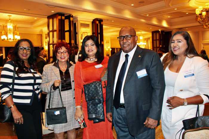 After informed opening remarks at the Nov. 14, 2025 Guyana Diaspora Forum Series: NY edition at the Vetro Restaurant in Howard Beach, Consul General to NY, Ambassador Michael E. Brotherson, fourth from left joins members of the diaspora for a photograph.