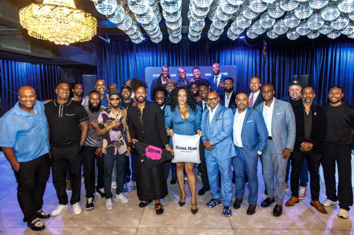 Dr. Nicole Grimes and honorees celebrate during CBN Boss Man Edition, the annual awards event recognizing Caribbean men leading in business, innovation, and community building across the U.S. and Canada.